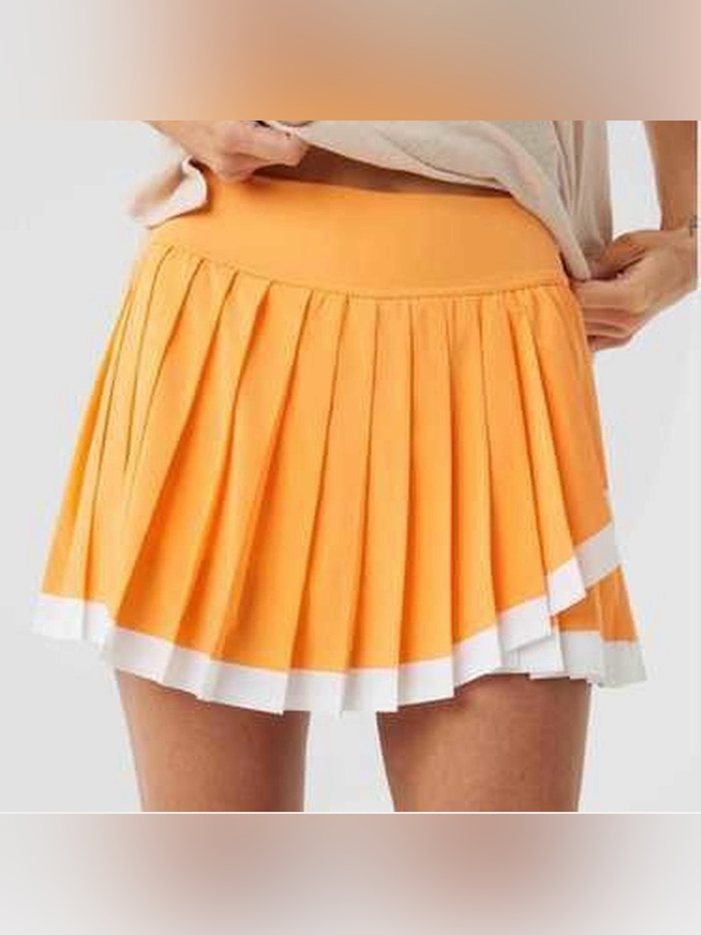 Aerie Orange pleated tennis skort with white trim size medium